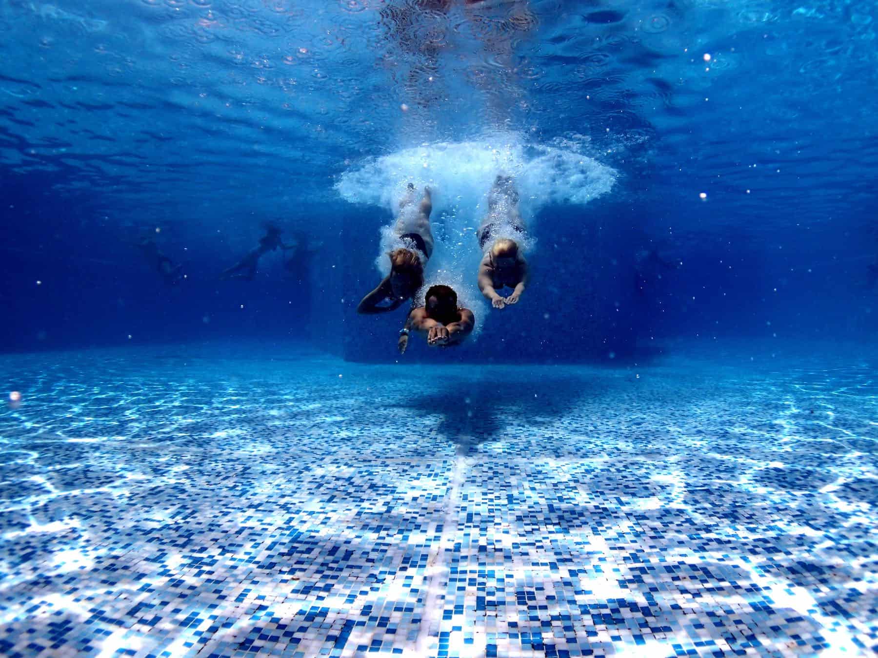 Diving into pool